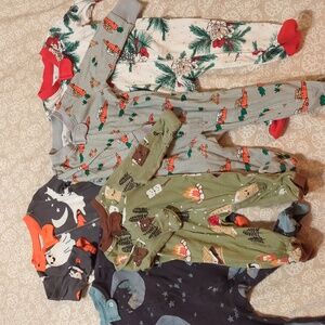 Assorted Honest And Burt's Bees Baby Onesies with Fun Prints